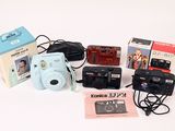 a camera and other items that are on the table