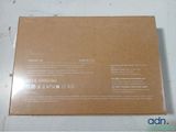 the back of the box is open on the table
