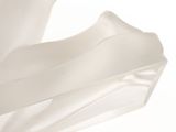 a close up of a piece of white cloth on a table