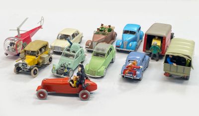 a lot of toy cars that are sitting on a table