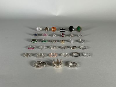 a lot of rings that are sitting on a table