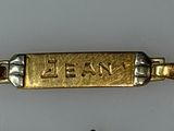 an image of a bracelet with the word lenn on it