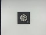a picture of a clock on a wall in a room