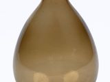 a brown glass vase with a blue top on a blue base
