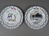 two plates with a picture of a man and a woman on them