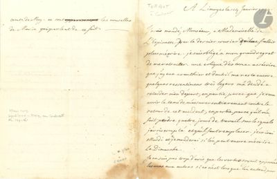 an old document with writing on it sitting on top of a table