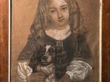 portrait of a young girl with a dog in her lap