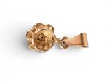 a close up of a gold plated flower charm on a white background