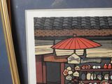 a picture of a picture of a store with a red umbrella