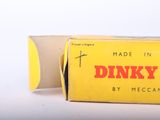a yellow box with a red logo on it sitting on a table
