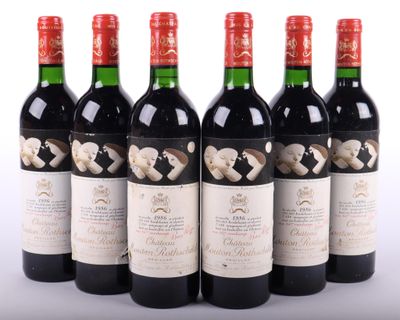 six bouteilles de vin rouge sont alignées