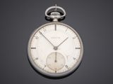 a silver pocket watch on a black background