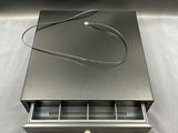 an image of a metal box with a power cord attached to it