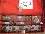 many wrenes in a red toolbox with a price tag