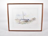 framed watercolor painting of a sailboat on the beach