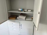 a cabinet with a bunch of files in it