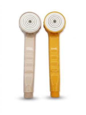 deux pommeaux de douche jaunes et blancs sur fond blanc