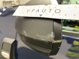 a close up of a parking meter with a sticker on it