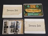 several old photos of people are in a box on a table