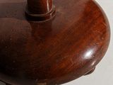 a small wooden object that is on a table