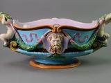 a blue bowl with a design on it and a horse on the side