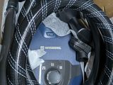 a box with a hose and a hose in it