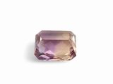an amethorate cut stone with a purple center
