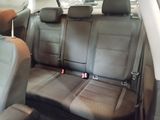 a picture of the back seats of a car in a car showroom