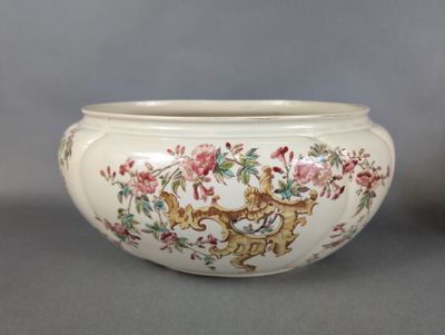 a white bowl with a floral design on it