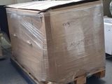 a large box on a pallet in a warehouse