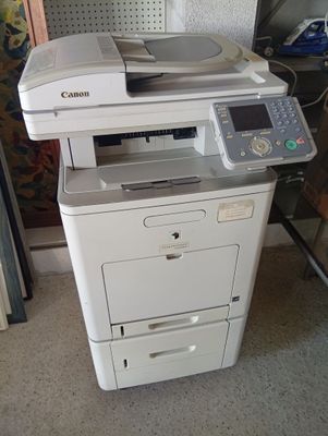 a printer that is sitting on top of a desk