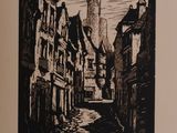 an image of a picture of a street with buildings and a clock tower