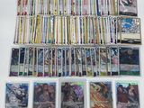 a large collection of pokemon trading cards are displayed on a table