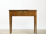 a small wooden table with drawers and a drawer underneath it
