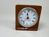 a clock with roman numerals on the face of it