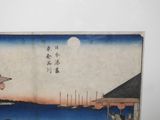 a picture of a painting of a person on a boat in the water