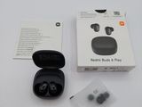 an image of a box of earphones sitting on top of a table