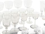 a lot of empty wine glasses on the table