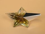 a glass star shaped object on a table