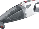 un gros plan d'un aspirateur à main sur fond blanc