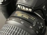 a close up of a camera with a lens attached to it