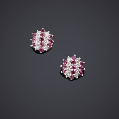 une paire de boucles d'oreilles en rubis et diamants