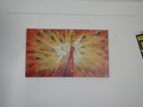 une photo d'un tableau accroché au mur