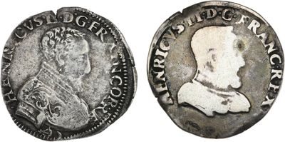 Gros plan sur une pièce de monnaie portant le visage d'un homme