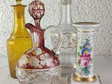 many different vases sitting on a table next to each other