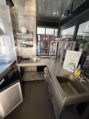a kitchen with stainless steel appliances and a sink