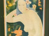 tableau représentant une femme avec des fleurs dans les cheveux, dans un cadre