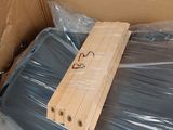a box that has a wooden sign on it