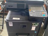 a printer that is sitting on top of a printer