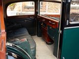 a car that has a bed in the back of it